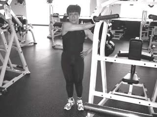 Fixed Bar Rear Deltoid Stretch