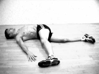 Lying Crossover Stretch