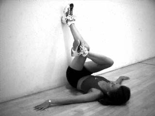 Lying Wall Glute Stretch